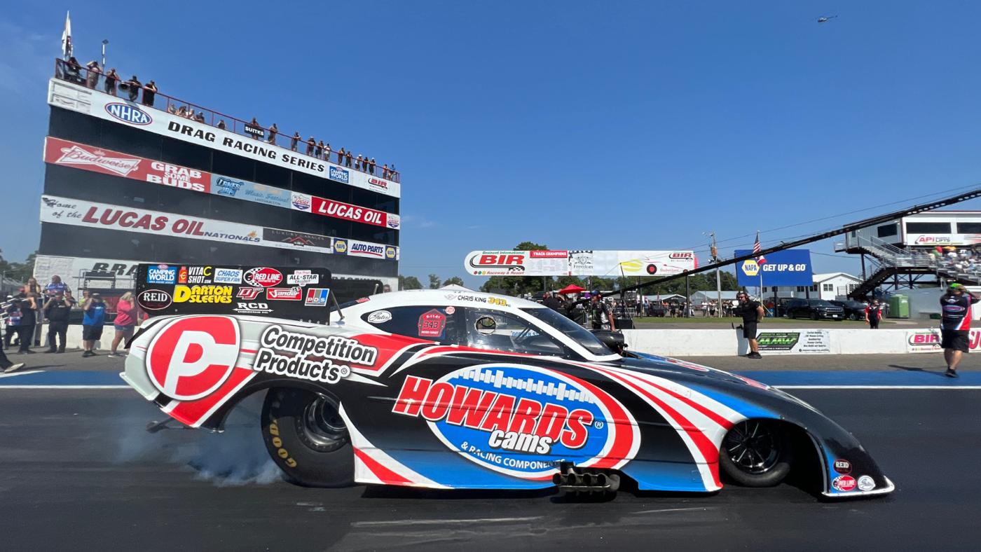 Chris King's #343 Funny Car doing a burnout