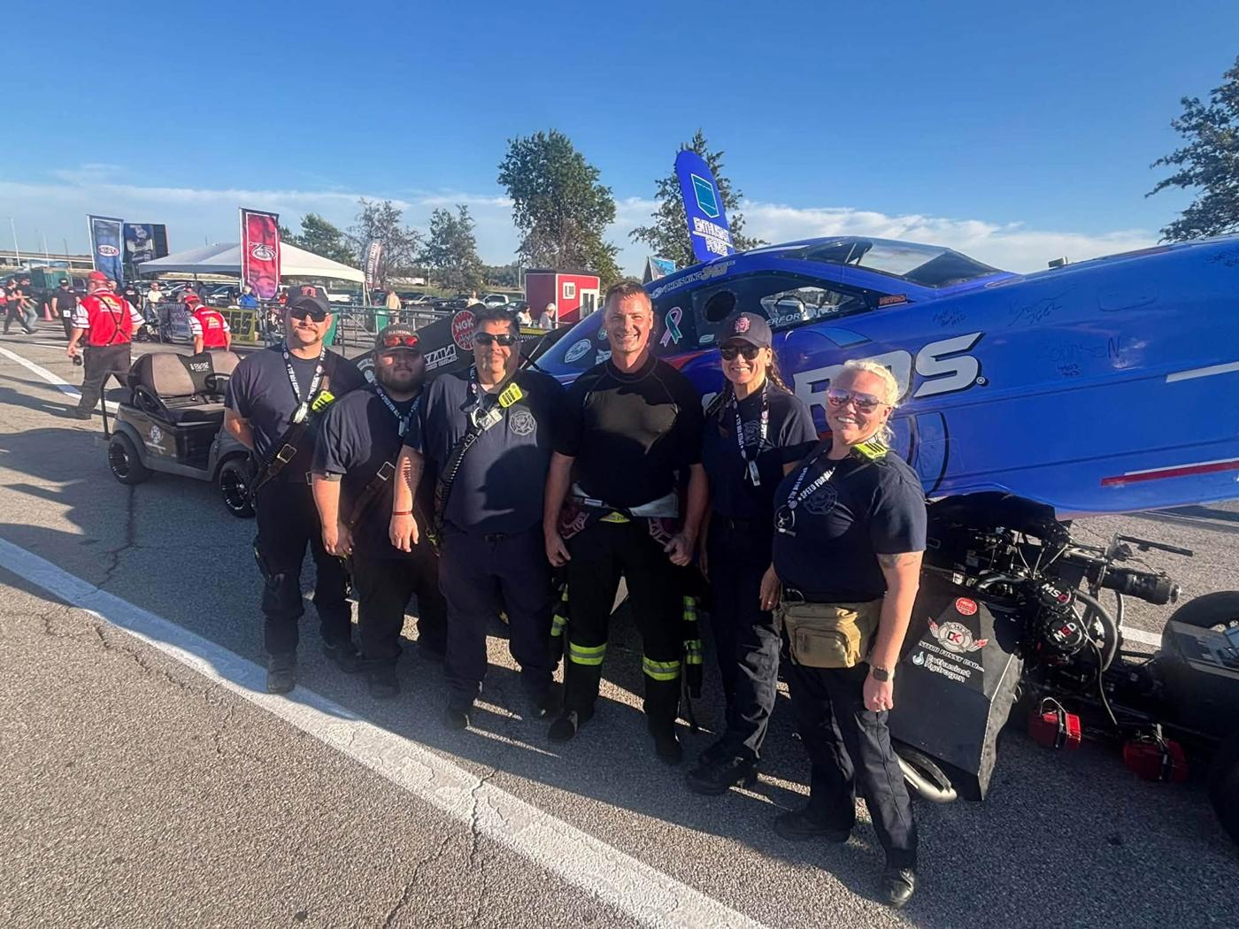 Madison firefighters with the car, Chris King's #343